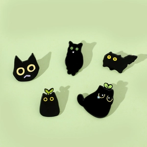 Set of five cute black cat enamel pins featuring diverse cartoon poses and green sprout details