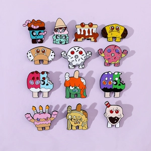 Collection of creative monster-themed enamel pins featuring donut and ice cream designs
