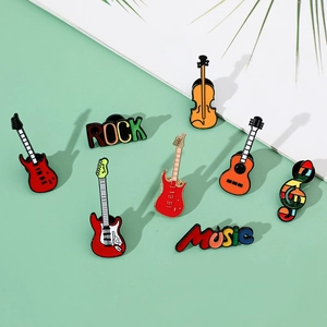 Détails de broches musicales en émail coloré avec guitares et clé de sol