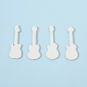 Set of four white guitar shaped metal DIY accessories for fridge magnets and badges