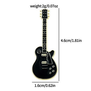 Detail view of black and gold guitar enamel pin showing 4.6cm height and 2g weight