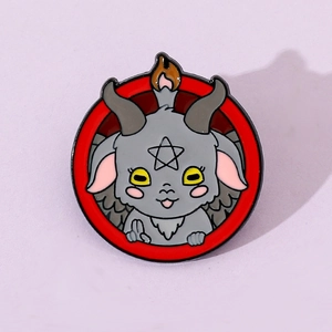 Detailed view of enamel pin featuring a cartoon Baphomet head on red circle