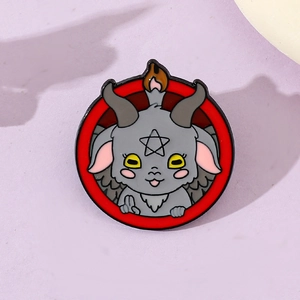 Close-up of a cartoon demon goat enamel pin with five-pointed star on red background