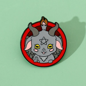 Cartoon enamel pin featuring a grey devil goat and red circle in creative gothic style