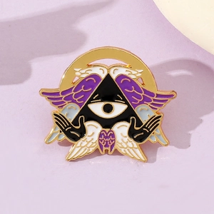 Detail of Cthulhu angel enamel pin featuring purple wings and all-seeing eye design