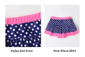 Close-up of girls polka dot swimwear bottom with pink ruffles and navy blue fabric