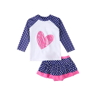 Girls long sleeve polka dot swimwear with heart print and ruffled skirt bottom