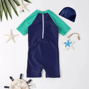 Kids dinosaur swimwear set with short sleeve jumpsuit and swim cap in navy and turquoise