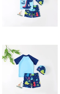 Three-piece boys' swimwear set featuring cartoon dinosaur prints and matching swimming cap