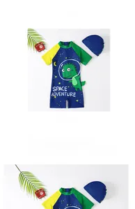 Detail of blue dinosaur print kids swimsuit with matching hat and yellow sleeves