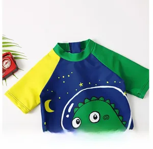 Detail of baby boys swimsuit collar with cartoon dinosaur print and high-quality stitching
