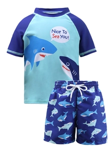 Detail of boys' shark print swimwear with quick-dry top and drawstring shorts