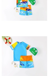 Completo mare bimbo con maglia dinosauro, pantaloncini e simpatico cappello da mostro