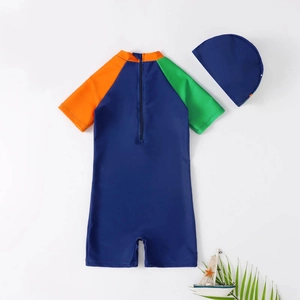 Kids navy and orange dinosaur cartoon swimsuit set with matching swimming cap