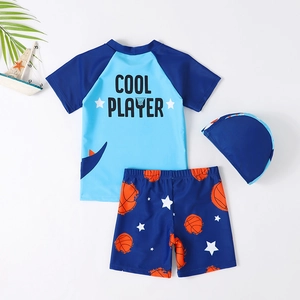 Three-piece boys' swimwear set with blue dinosaur pattern and cool player basketball print