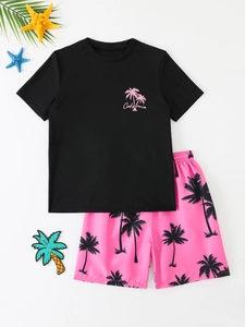 Detail of kids two-piece beachwear with California palm tree print and pink swim shorts