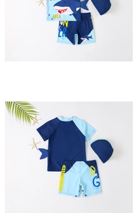 Three-piece boy's swimsuit set with blue shark cartoon print and matching sun hat