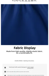 Detail of blue shark kids swimwear fabric showing soft texture and high elasticity
