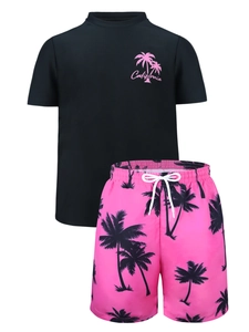Detail of kids swimwear with California print and pink palm tree pattern shorts