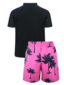Detail of kids black short sleeve rash guard and pink tropical palm tree print shorts