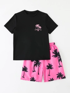 Detail of tropical palm tree print and California text on kids beachwear set