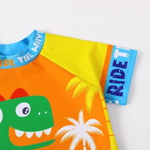 Maglia da nuoto per bambini a maniche corte con dinosauro verde e palme tropicali