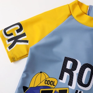 Short sleeve cartoon boy swimsuit in blue and yellow with ROCK print and cool graphic