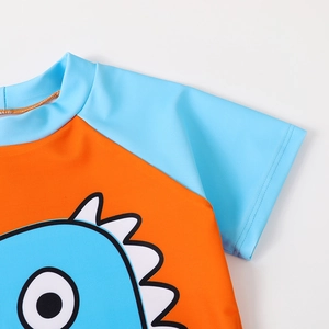 Short sleeve kids dinosaur swimsuit in vibrant orange and light blue quick-dry fabric