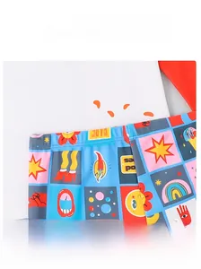Detail of kids swimwear elastic waistband showing colorful pop-art cartoon patterns