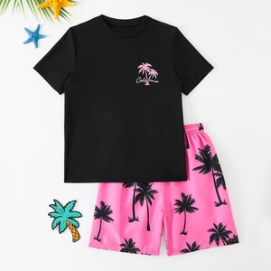 Two-piece kids swimwear set with black California palm tree top and pink shorts