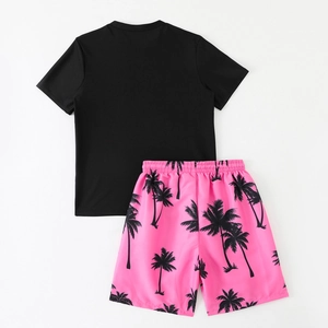 Kids quick-dry swimwear set with black short sleeve top and pink coconut tree shorts