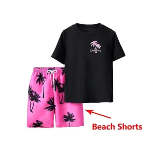 Kids quick-dry swimwear set featuring black California t-shirt and pink palm tree beach shorts