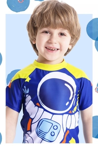 Close-up of boys astronaut print swim shirt with yellow contrast sleeves and blue body