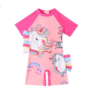Girls unicorn one piece swimsuit with short sleeves and colorful ruffled waist detail