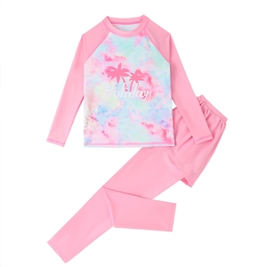 Girls long sleeve floral swimwear set with pink holiday palm print and sun protection