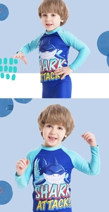 Detail of boys' shark print long-sleeve swimwear with Shark Attack graphic design