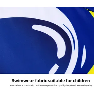 Detail of UPF 50 plus fabric on boys astronaut swimwear with Class A safety standard