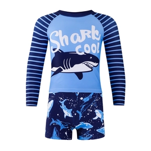 Kids shark print swimwear set with long sleeve rash guard and blue printed swim shorts