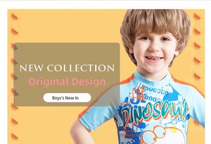 Close-up of boys dinosaur swimwear featuring short sleeves and protective sun fabric