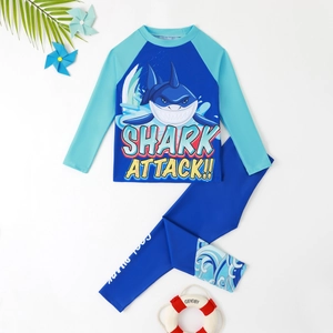 Two-piece boys long sleeve shark print swimsuit set with blue leggings and rash guard