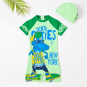 Kids short sleeve one-piece swimsuit with cartoon crocodile print and matching swim cap