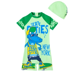 Kids one-piece green swimsuit with cartoon alligator print and matching swim cap