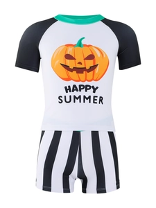 Detail of boys' UV protection swimwear with pumpkin print and striped shorts