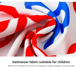 Detailed macro view of Class A UPF 50+ high-stretch sun-protective boys' swimwear fabric