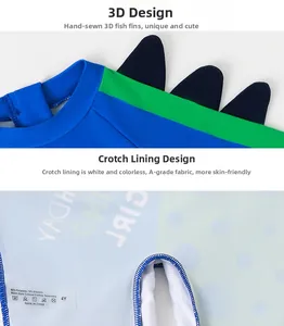 Detail view of 3D fins on shoulders and white A-grade inner lining of boys swimwear
