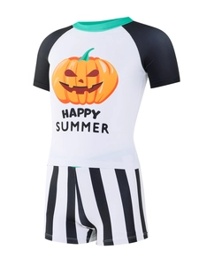 Detail of boys' two-piece swimsuit featuring pumpkin print top and striped shorts