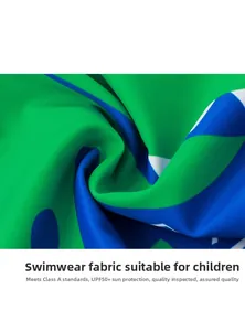 Close-up of UPF 50+ sun protection fabric with geometric print for kids swimwear