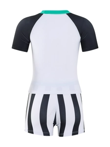 Detail view of boys' two-piece swimsuit featuring black raglan sleeves and striped shorts