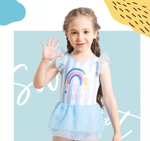 Detail of girls one-piece striped swimsuit featuring rainbow print and mesh skirt