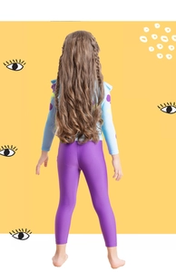 Rear view of long-sleeve kids' swimwear with ruffles and purple pants for sun protection